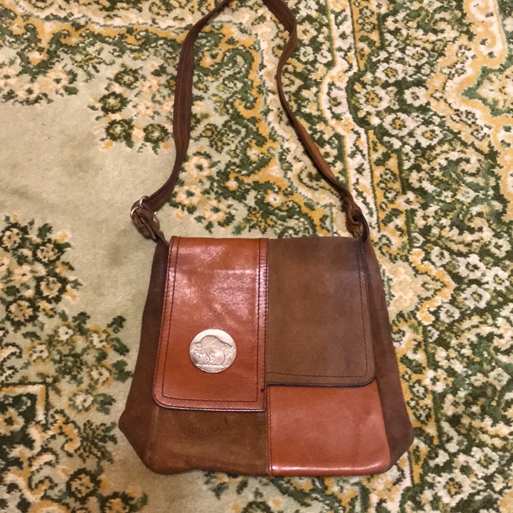 Brown leather buffalo nickel purse